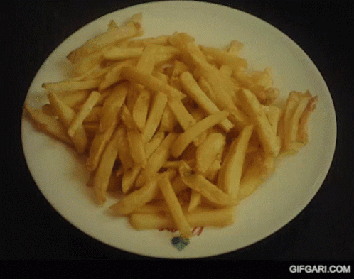 A Plate Of French Fries With A Gifgari.com Logo GIF