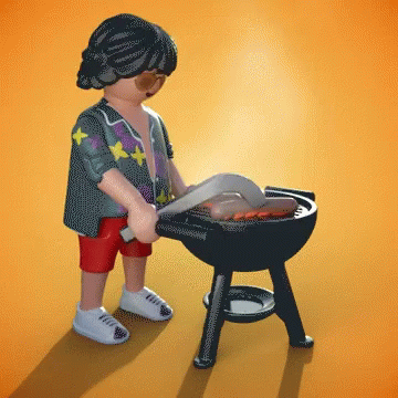 A Playmobil Figure Is Cooking Sausages On A Barbecue Grill GIF