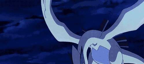 A Pokemon Is Flying Through The Air With Its Wings Spread In The Dark . GIF
