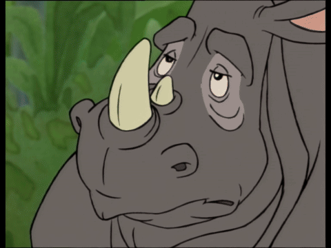 A Polar Bear Standing Next To A Rhino In A Cartoon GIF