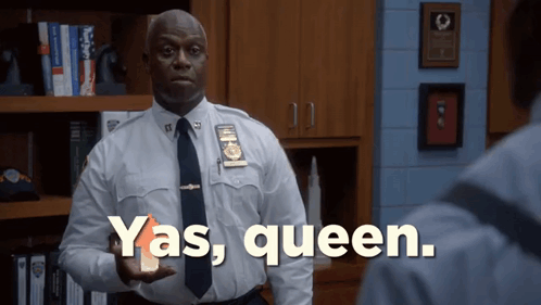 A Police Officer In A White Shirt And Tie Is Holding A Bottle Of Yas Queen GIF