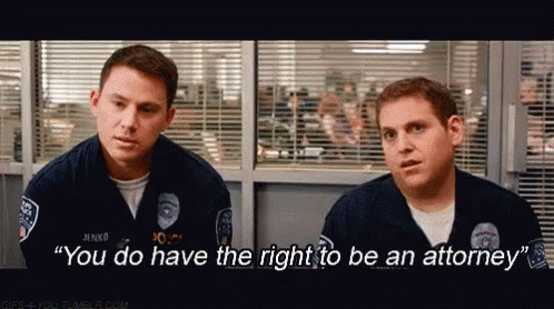 Police Officer Telling Another You Have Right To Attorney GIF
