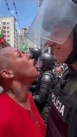 A Police Officer With The Word Policia On His Uniform GIF