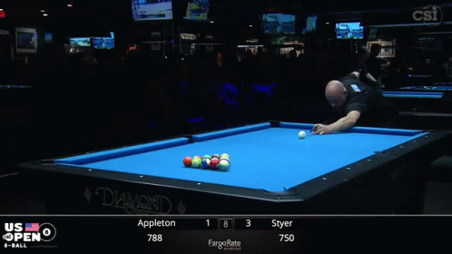 A Pool Table That Says Diamond On It With A Man Standing In Front Of It GIF