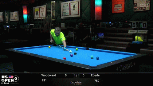 A Pool Table With A Blue Cloth And A Person Holding A Cue On It GIF