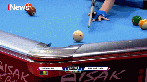 a pool table with silviana lu and rini nasution playing pool