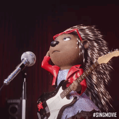 A Porcupine Is Singing Into A Microphone And Playing A Guitar . GIF
