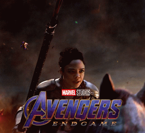 A Poster For Avengers Endgame Shows A Woman Holding A Sword GIF