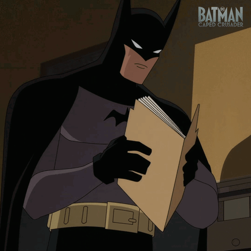 A Poster For Batman Caped Crusader Shows A Cartoon Character Reading A Book GIF