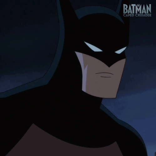A Poster For Batman Caped Crusader Shows Batman In A Black Suit GIF