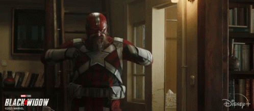Black Widow Poster With Man In Red And White Costume GIF
