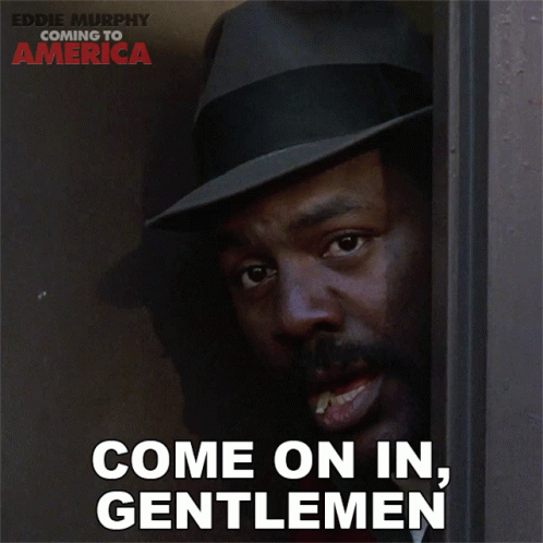 A Poster For Coming To America Shows A Man In A Hat Smiling GIF