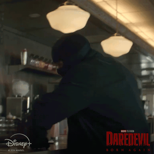 A Poster For Daredevil Born Again With A Man In A Mask GIF