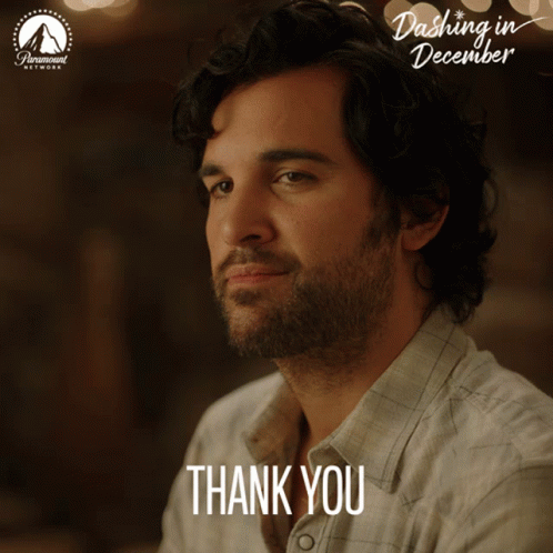 A Poster For Dash In December Shows A Man With A Beard Saying Thank You GIF