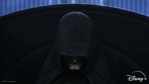 A Poster For Disney + Shows A Person In A Hooded Cloak GIF