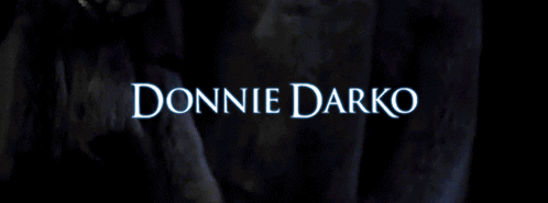 A Poster For Donnie Darko Features A Statue GIF