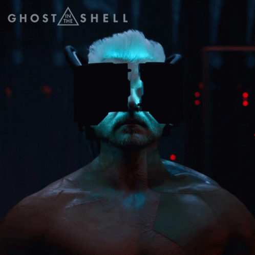 A Poster For Ghost In The Shell Shows A Man With A Beard GIF