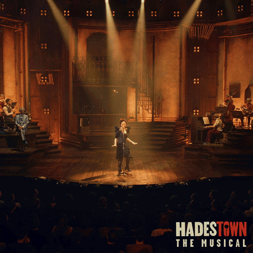 A Poster For Hadestown The Musical Shows A Woman Singing GIF