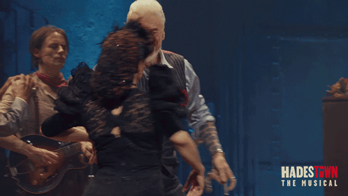 A Poster For Hadestown The Musical Shows Three People Dancing GIF
