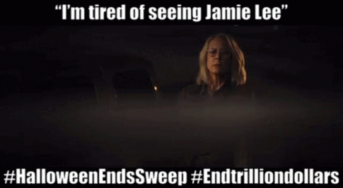A Poster For Halloween Ends Sweep Shows A Woman In The Dark GIF