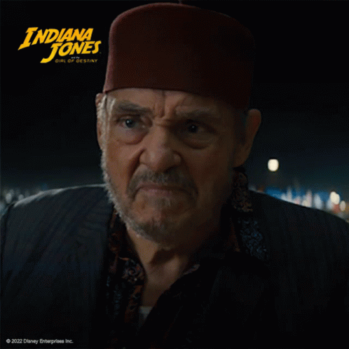A Poster For Indiana Jones The Girl Of Destiny Shows A Man With A Beard GIF
