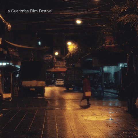 A Poster For La Guarimba Film Festival Shows A Dark Street GIF