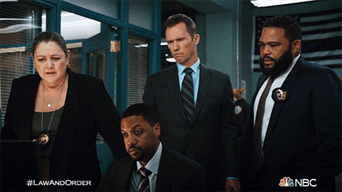 A Poster For Law And Order Shows A Group Of People In Suits GIF
