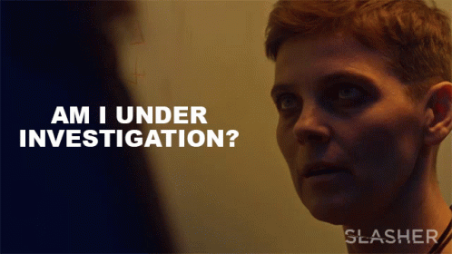 A Poster For Slasher Shows A Woman Looking At Another Person GIF