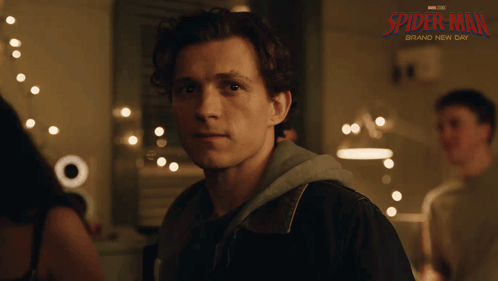 A Poster For Spider Man Brand New Day Shows A Man In A Dark Room GIF