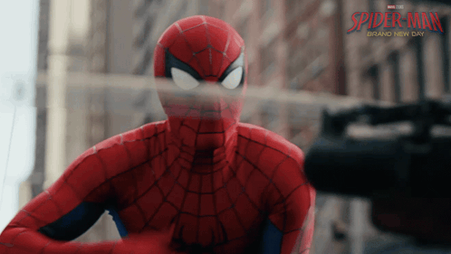 A Poster For Spider-Man Brand New Day Shows A Spider-Man Holding A Gun GIF