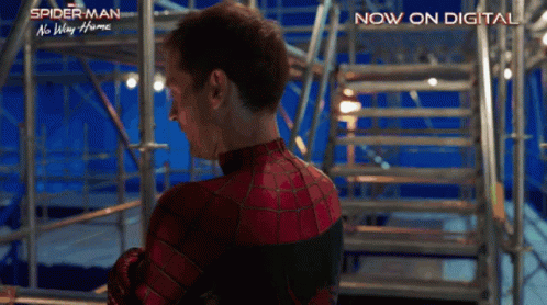 A Poster For Spider Man No Way Home Shows A Man In A Spider Man Suit GIF