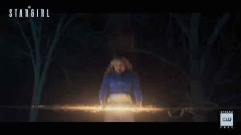 A Poster For Stargirl Shows A Woman In A Blue Shirt GIF