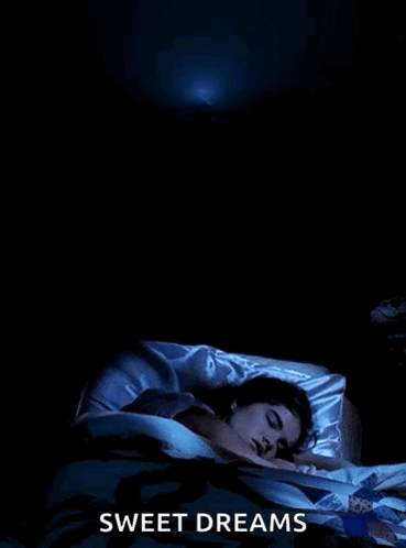 A Poster For Sweet Dreams Shows A Woman Sleeping In A Bed GIF