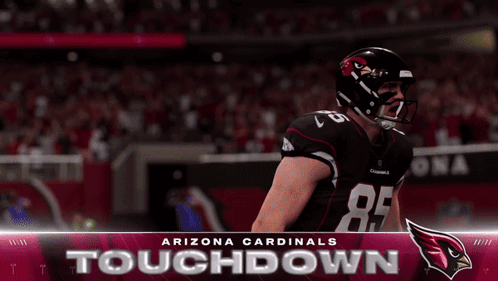 A Poster For The Arizona Cardinals Touchdown With Two Players On The Field GIF