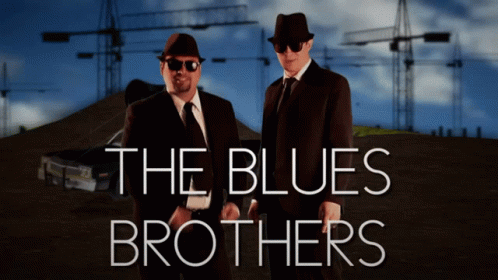 A Poster For The Blues Brothers With Two Men In Suits GIF