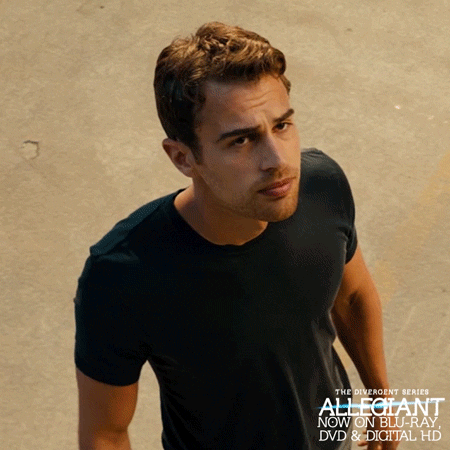 A Poster For The Divergent Series Allegiance Shows A Man In A Black T-Shirt GIF
