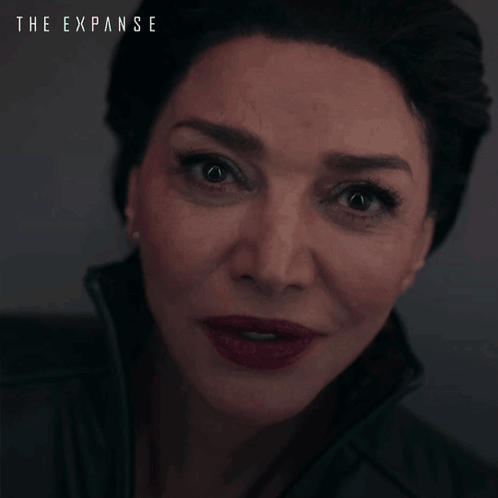 A Poster For The Expanse Shows A Woman 'S Face And Says The Whole Planet Not Pulling Me GIF