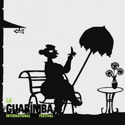 A Poster For The Guarimba International Film Festival Shows A Woman Sitting Under An Umbrella GIF