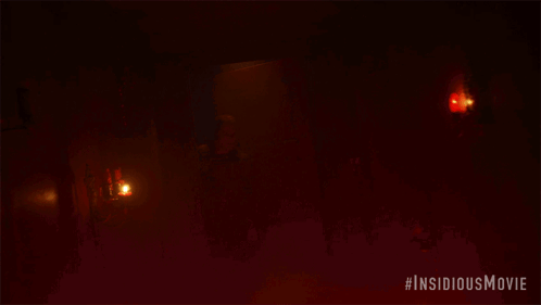 a poster for the insidious movie is shown
