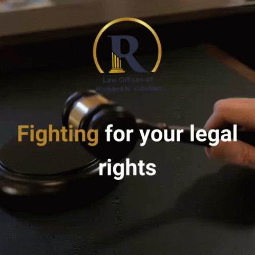 A Poster For The Law Offices Of Richard N. Gottlieb Shows A Person Holding A Gavel GIF