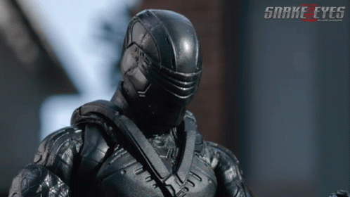 A Poster For The Movie Snake Eyes Shows A Man In A Black Helmet GIF