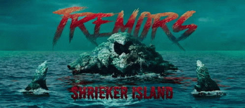 A Poster For Tremors Showing A Skull On A Small Island GIF