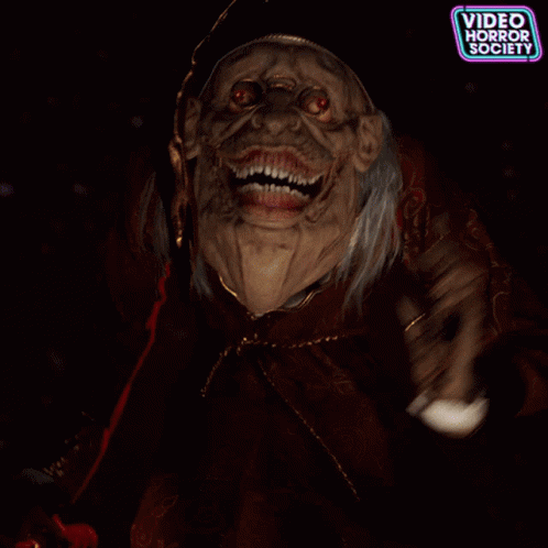 A Poster For Video Horror Society Shows A Scary Witch GIF