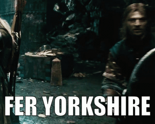 A Poster That Says Fer Yorkshire With A Man Standing In The Background GIF