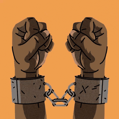 a poster that says " is free " with a fist in the foreground