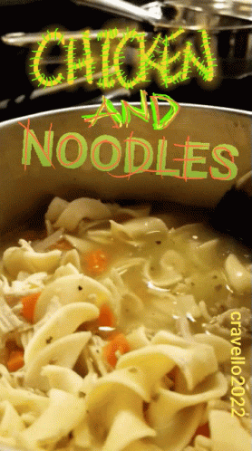 A Pot Of Chicken And Noodles Being Cooked GIF
