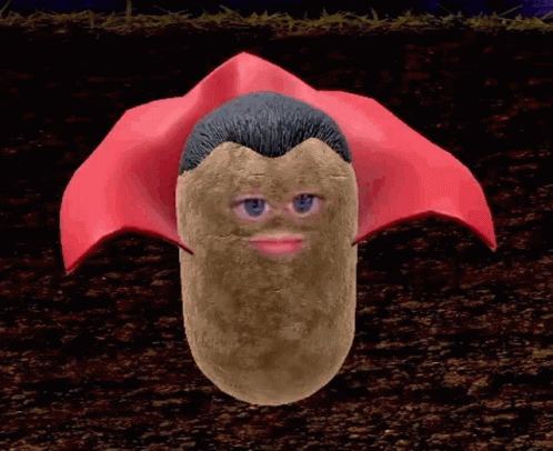 A Potato With A Man 'S Face And Blue Eyes Is Wearing A Red Cape GIF