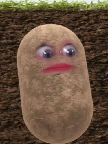 A Potato With Big Eyes And A Pink Lip Is In The Dirt GIF