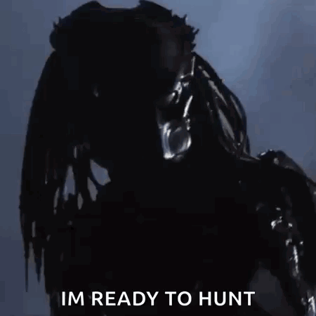 A Predator From The Movie Predator Is Ready To Hunt Someone . GIF