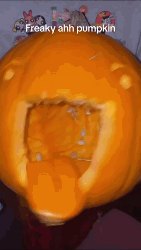 A Pumpkin With A Hole In It And The Words Freaky Ahh Pumpkin Below It GIF